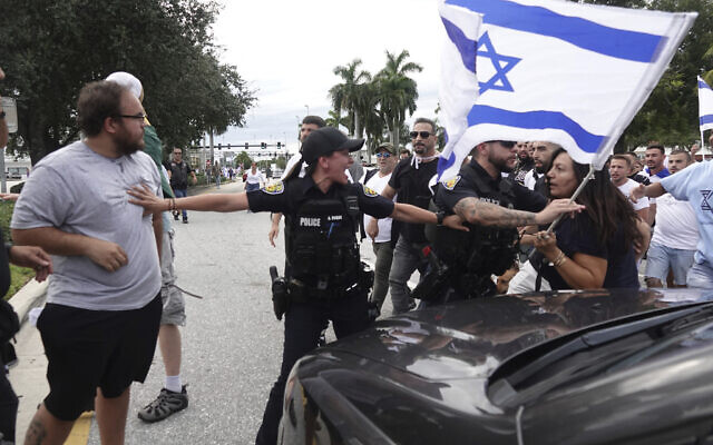 Fort Lauderdale police separate members of pro-Israel and pro-Palestinian protests, Sunday, Oct. 8, 2023, in Fort Lauderdale, Florida. (Joe Cavaretta/South Florida Sun-Sentinel via AP, File) Fort Lauderdale police separate members of pro-Israel and pro-Palestinian protests, Sunday, Oct. 8, 2023, in Fort Lauderdale, Florida. (Joe Cavaretta/South Florida Sun-Sentinel via AP, File)