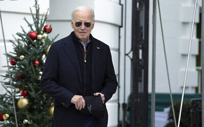 US President Joe Biden walks towards the members of the media as he leaves the White House Dec. 23, 2023. (AP/Manuel Balce Ceneta)