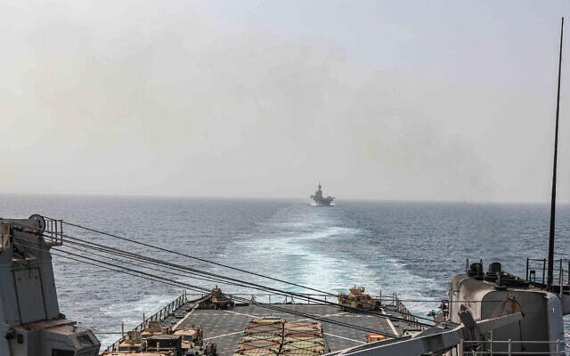 In this image provided by the US Navy, the amphibious dock landing ship USS Carter Hall and amphibious assault ship USS Bataan transit the Bab al-Mandeb strait on August 9, 2023. (Mass Communications Spc. 2nd Class Moises Sandoval/US Navy via AP) In this image provided by the US Navy, the amphibious dock landing ship USS Carter Hall and amphibious assault ship USS Bataan transit the Bab al-Mandeb strait on August 9, 2023. (Mass Communications Spc. 2nd Class Moises Sandoval/US Navy via AP)