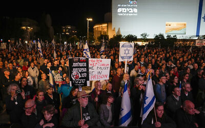 Israelis protest against Prime Minister Benjamin Netanyahu's government in Tel Aviv, Israel, Saturday, Dec. 30, 2023. (AP/Ariel Schalit) Israelis protest against Prime Minister Benjamin Netanyahu's government in Tel Aviv, Israel, Saturday, Dec. 30, 2023. (AP/Ariel Schalit)