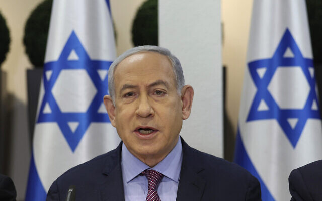 Prime Minister Benjamin Netanyahu attends the weekly cabinet meeting at the Kirya military headquarters n Tel Aviv, Dec. 31, 2023. (Abir Sultan/Pool Photo via AP)