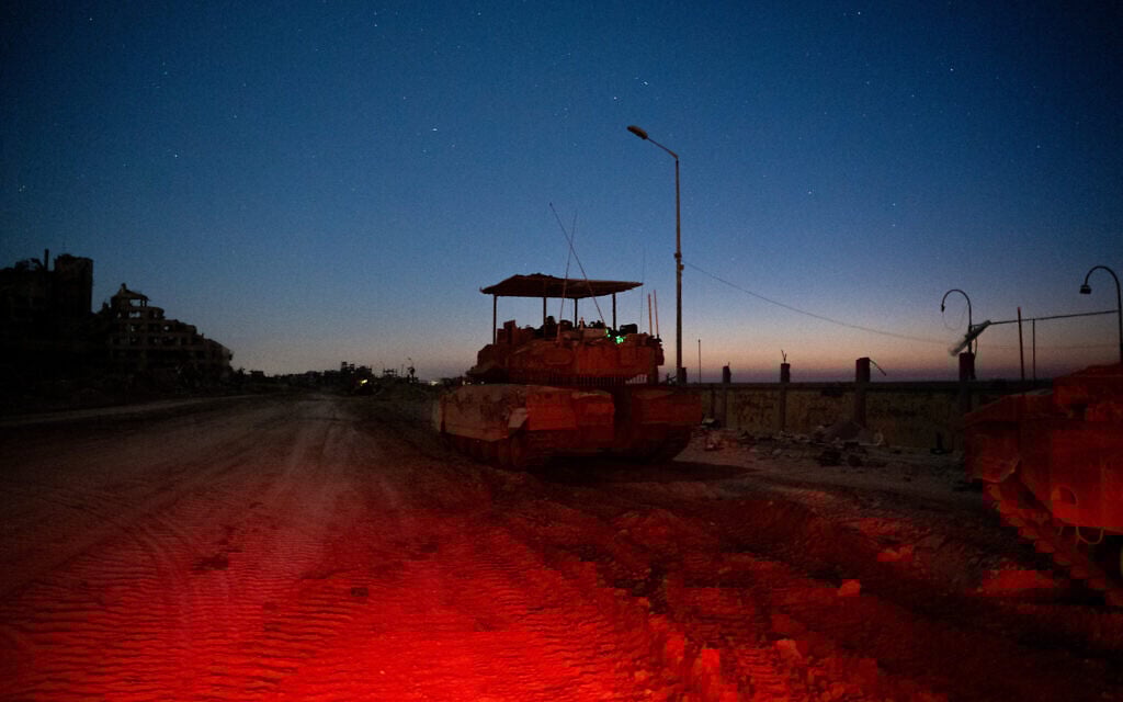 An IDF tank is seen in the Gaza Strip, December 19, 2023. (Emanuel Fabian/Times of Israel)