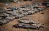 File: Israeli soldiers seen at a staging area near the Israeli-Gaza border, southern Israel, November 30, 2023. (Avshalom Sassoni/Flash90)