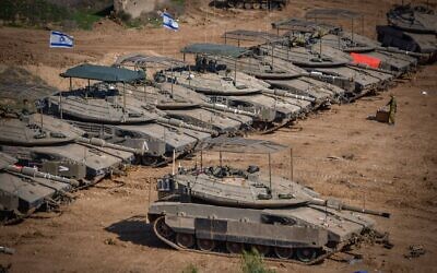 File: Israeli soldiers seen at a staging area near the Israeli-Gaza border, southern Israel, November 30, 2023. (Avshalom Sassoni/Flash90)