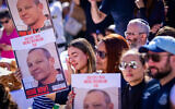 Israelis take part in a prayer for the release of hostages held by Hamas terrorists in Gaza, at Hostage Square in Tel Aviv, December 1, 2023. (Tomer Neuberg/Flash90)