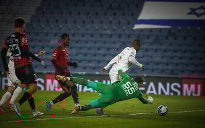 The Israeli Premier League match between Hapoel Jerusalem and Hapoel Haifa, without a crowd in attendance at Teddy Stadium in Jerusalem on December 10, 2023. (Oren Ben Hakoon/Flash90)