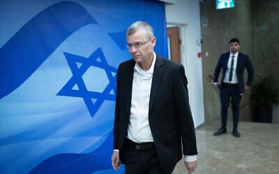 File - Justice Minister Yariv Levin arrives at a cabinet meeting at the Prime Minister's Office in Jerusalem on December 10, 2023. (Yonatan Sindel/Flash90)