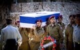 Illustrative: Family and friends of Israeli soldier St.-Sgt.-Maj. (res.) Zvika Lavi mourn at his funeral at the Mount Herzl Military Cemetery in Jerusalem on December 12, 2023. (Yonatan Sindel/Flash90)