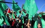 Hamas supporters take part in a demonstration in Hebron, West Bank, December 15, 2023. (Wisam Haslmaoun/Flash90)