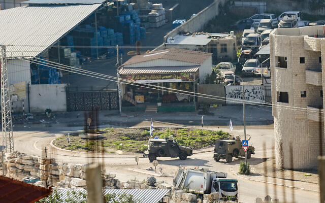 Israeli security forces seen during a raid in Tulkarem, in the West Bank, December 17, 2023. (Nasser Ishtayeh/Flash90)