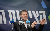 Finance minister and head of the Religious Zionist party, Bezalel Smotrich leads a faction meeting at the Knesset in Jerusalem, December 18, 2023. (Chaim Goldberg/ Flash90)
