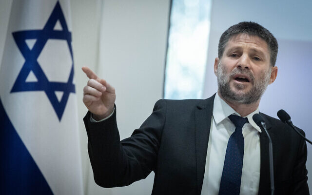 Finance Minister Bezalel Smotrich attends a ceremony at the President's Residence in Jerusalem, December 18, 2023. (Chaim Goldberg/Flash90)
