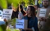 Members of the far-left Jewish advocacy group IfNotNow sing during a protest outside the Los Angeles home of Vice President Kamala Harris calling "on those in power to oppose any policies that privilege one group of people over another, in Israel/Palestine and in the US," October 19, 2023. (Irfan Khan / Los Angeles Times via Getty Images)