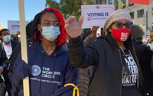 Illustrative: Activists from the Workers Circle and Black Voters Matter on their way to a protest outside the White House in 2021. (Workers Circle via JTA)