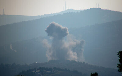 Smoke billows after an Israeli strike on Lebanon's southern town of Kfar Kila near the border with Israel on December 30, 2023. (AFP)