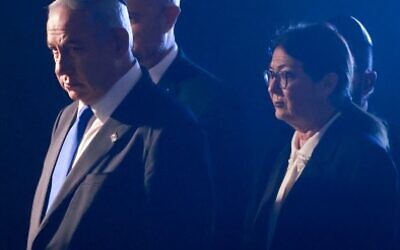 Prime Minister Benjamin Netanyahu, left, attends a ceremony in the Hall of Remembrance at the Yad Vashem holocaust museum, on Holocaust Remembrance Day April 18, 2023. (Erik Marmor/Flash90)
