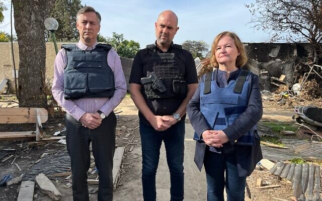European Union Parliament member David McAllister (L), Nathalie Loiseau (R) and Knesset Speaker Amir Ohana tour Kibbutz Kfar Aza on December 10, 2023. (Jacob Magid/Times of Israel) European Union Parliament member David McAllister (L), Nathalie Loiseau (R) and Knesset Speaker Amir Ohana tour Kibbutz Kfar Aza on December 10, 2023. (Jacob Magid/Times of Israel)