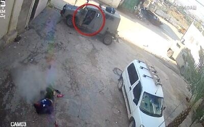 Footage of an IDF soldier shooting dead a Palestinian suspect in the al-Faraa refugee camp in the Jordan Valley of the West Bank on December 8, 2023. (Screen capture/YouTube)