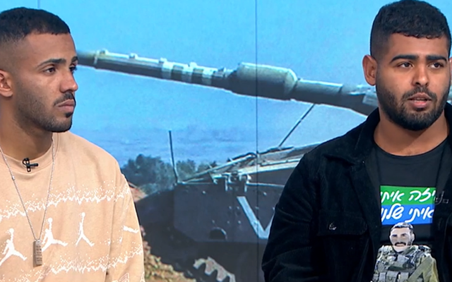 Brothers Daniel (R) and Neria (L) Sharabi, who saved dozens at the October 7 Nova massacre, in a Channel 13 TV interview, December 28, 2023. (Screen capture: Channel 13. Used in accordance with Clause 27a of the Copyright Law.) Brothers Daniel (R) and Neria (L) Sharabi, who saved dozens at the October 7 Nova massacre, in a Channel 13 TV interview, December 28, 2023. (Screen capture: Channel 13. Used in accordance with Clause 27a of the Copyright Law.)