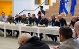 Defense Minister Yoav Gallant meets with mayors and local council heads of northern border towns in Nahariya on December 6, 2023. (Ariel Hermoni/ Defense Ministry)
