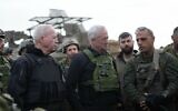 Defense Minister Yoav Gallant (left) and war cabinet Minister Benny Gantz in northern Gaza's Beit Hanoun, December 23, 2023. (Elad Malka/Defense Ministry)