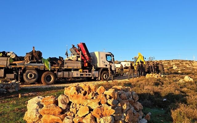 Border Police forces evacuate and demolish the illegal West Bank outpost of Sde Yonatan, December 26, 2023. (Courtesy) Border Police forces evacuate and demolish the illegal West Bank outpost of Sde Yonatan, December 26, 2023. (Courtesy)