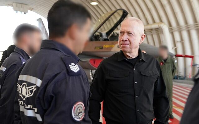 In this handout photo, Defense Minister Yoav Gallant tours the Ramat David air base in northern Israel, December 29, 2023. (Ariel Hermoni/Defense Ministry) In this handout photo, Defense Minister Yoav Gallant tours the Ramat David air base in northern Israel, December 29, 2023. (Ariel Hermoni/Defense Ministry)