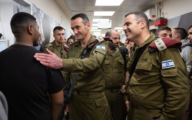 IDF Chief of Staff Lt. Gen. Herzi Halevi (center) speaks to new conscripts at the IDF's main induction center at the Tel Hashomer base in Ramat Gan, December 6, 2023. (Israel Defense Forces) IDF Chief of Staff Lt. Gen. Herzi Halevi (center) speaks to new conscripts at the IDF's main induction center at the Tel Hashomer base in Ramat Gan, December 6, 2023. (Israel Defense Forces)