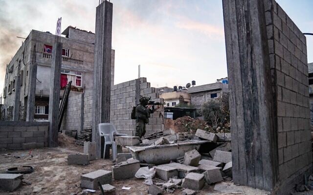 IDF soldiers seen operating in the Gaza Strip in this handout photo published on December 12, 2023. (IDF) IDF soldiers seen operating in the Gaza Strip in this handout photo published on December 12, 2023. (IDF)