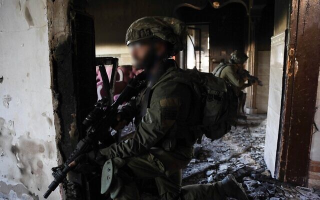Troops of the IDF's 252nd Reserve Division operate in northern Gaza's Beit Hanoun, in a handout image published December 18, 2023. (Israel Defense Forces) Troops of the IDF's 252nd Reserve Division operate in northern Gaza's Beit Hanoun, in a handout image published December 18, 2023. (Israel Defense Forces)