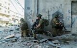 IDF troops seen operating in the Gaza Strip in this handout photo released December 23, 2023. (Israel Defense Forces)