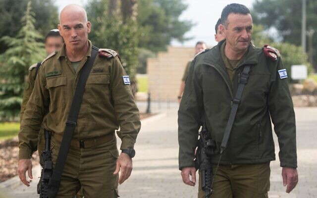 IDF Chief of Staff Lt. Gen. Herzi Halevi (right) walks with Northern Command chief Maj. Gen. Ori Gordin, at the northern command HQ in Safed, December 27, 2023. (Israel Defense Forces)