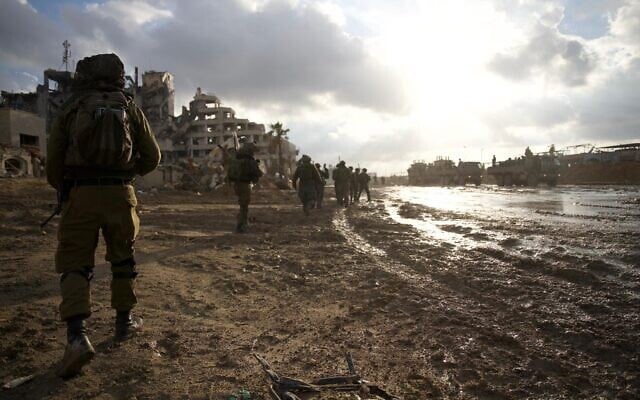 IDF forces operate in the Gaza Strip, in a handout photo released on December 31, 2023. (Israel Defense Forces) IDF forces operate in the Gaza Strip, in a handout photo released on December 31, 2023. (Israel Defense Forces)
