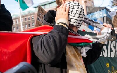 Illustrative: Pro-Palestinian, anti-Israel demonstrators rally near Columbia University in New York on November 15, 2023. (Spencer Platt / Getty images / AFP)