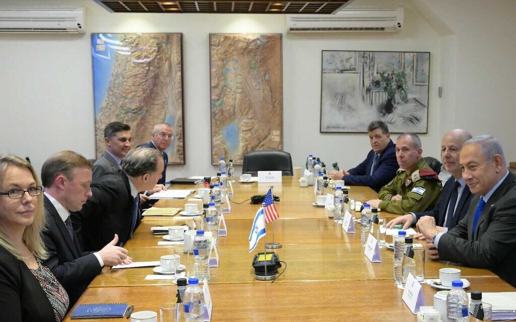 Prime Minister Benjamin Netanyahu hosts US National Security Adviser Jake Sullivan at the Kirya in Tel Aviv, December 14, 2023. (Amos Ben Gershom/GPO)