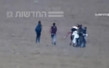 Former hostage Amit Soussana seen fighting against Hamas kidnappers, dragging her into Gaza on October 7, 2023. She has since spoken about experiencing sexual abuse during her captivity. (Screenshot used in accordance with clause 27a of the copyright law)