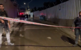 Police on the scene of a deadly shooting in Lod on December 29, 2023. (Screenshot/Israel Police)