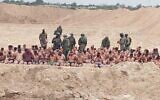 Palestinian men said to have surrendered to the IDF in the Jabaliya area of northern Gaza on December 7, 2023. (Social media: used in accordance with clause 27a of the copyright law)