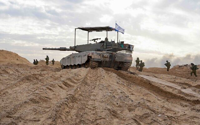 IDF troops seen operating in the Gaza Strip in this handout photo released for publication on December 10, 2023. (IDF) IDF troops seen operating in the Gaza Strip in this handout photo released for publication on December 10, 2023. (IDF)