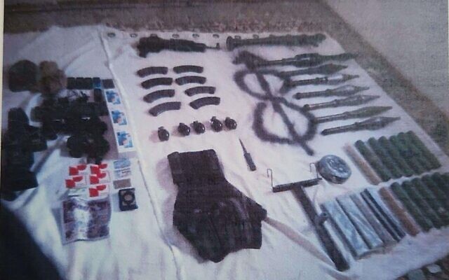 A cache of weapons was found in a vehicle belonging to Hamas parliamentarian Mushir al-Masri, the IDF revealed on December 14, 2023. (Israel Defense Forces)