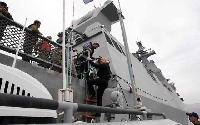 Defense Minister Yoav Gallant boards the INS Magen Sa'ar 6-class corvette at the Eilat port, December 20, 2023 (Ariel Hermoni/Defense Ministry) Defense Minister Yoav Gallant boards the INS Magen Sa'ar 6-class corvette at the Eilat port, December 20, 2023 (Ariel Hermoni/Defense Ministry)