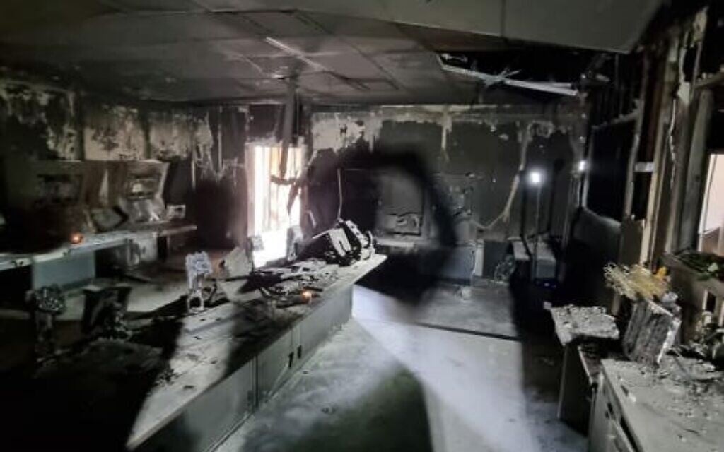 The torched command center of the Nahal Oz IDF base, overrun by Hamas terrorists on October 7, 2023, during a visit by relatives of slain lookout soldiers on December 19, 2023. (Courtesy/Eyal Eshel) The torched command center of the Nahal Oz IDF base, overrun by Hamas terrorists on October 7, 2023, during a visit by relatives of slain lookout soldiers on December 19, 2023. (Courtesy/Eyal Eshel)