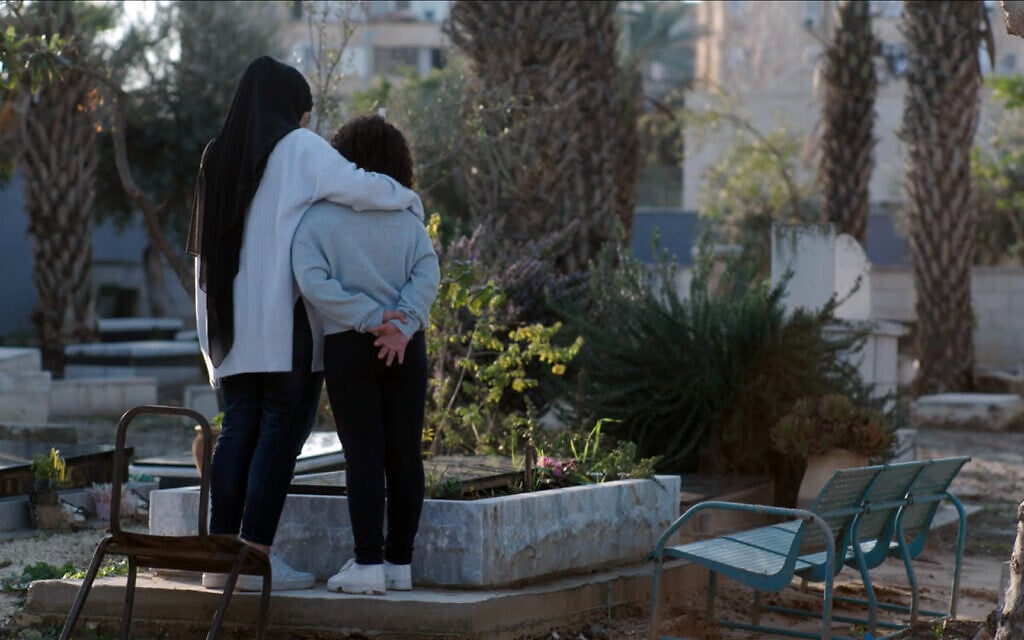 Marwa, left, and Milla, the widow and daughter of Musa Hassuna, an Arab Israeli man killed in a violent protest in Lod, in a still from 'Mourning in Lod,' directed by Hilla Medalia. (Courtesy of MTV Documentary Films) Marwa, left, and Milla, the widow and daughter of Musa Hassuna, an Arab Israeli man killed in a violent protest in Lod, in a still from 'Mourning in Lod,' directed by Hilla Medalia. (Courtesy of MTV Documentary Films)