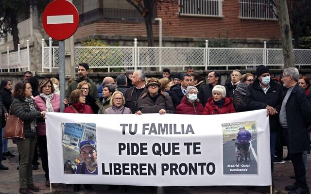 Protesters hold a banner reading 'Your family asks to be released soon' during a rally asking for the freedom of Santiago Sanchez Cogedor, near the Iranian embassy in Madrid, on December 18, 2022. (THOMAS COEX / AFP) Protesters hold a banner reading 'Your family asks to be released soon' during a rally asking for the freedom of Santiago Sanchez Cogedor, near the Iranian embassy in Madrid, on December 18, 2022. (THOMAS COEX / AFP)