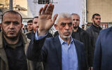 Yahya Sinwar, Hamas's Gaza Strip chief, waves to supporters in Gaza City, on April 14, 2023. (Mohammed Abed/AFP)