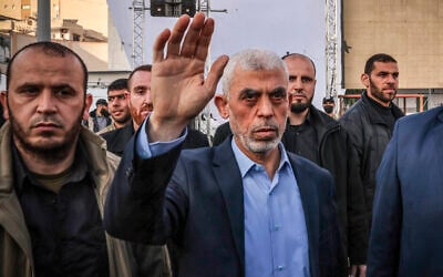 Yahya Sinwar, Hamas's Gaza Strip chief, waves to supporters in Gaza City, on April 14, 2023. (Mohammed Abed/AFP)