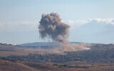 Illustrative: Smoke billows from an airstrike in Syria's rebel-held northwestern Idlib province, on August 26, 2023. (OMAR HAJ KADOUR / AFP)