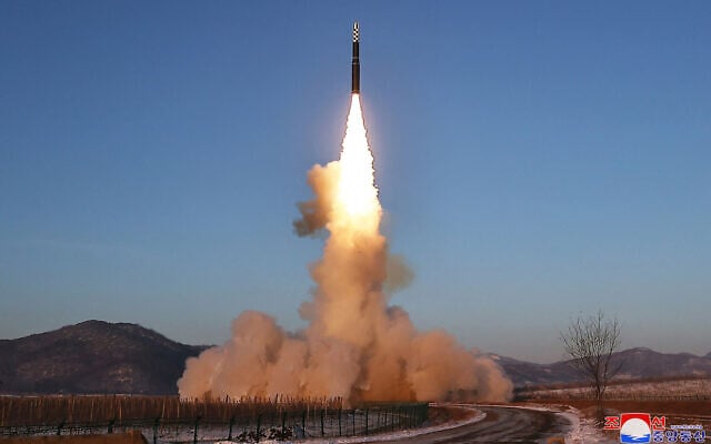 This undated picture released by North Korea's official Korean Central News Agency (KCNA) on December 19, 2023, shows the test launch of a Hwasongpho-18 intercontinental ballistic missile (ICBM) at an undisclosed location in North Korea. (KCNA VIA KNS / AFP)