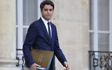 French Education and Youth Minister Gabriel Attal leaves after the weekly cabinet meeting at the presidential Elysee Palace in Paris, on December 20, 2023. (Ludovic Marin/ AFP)