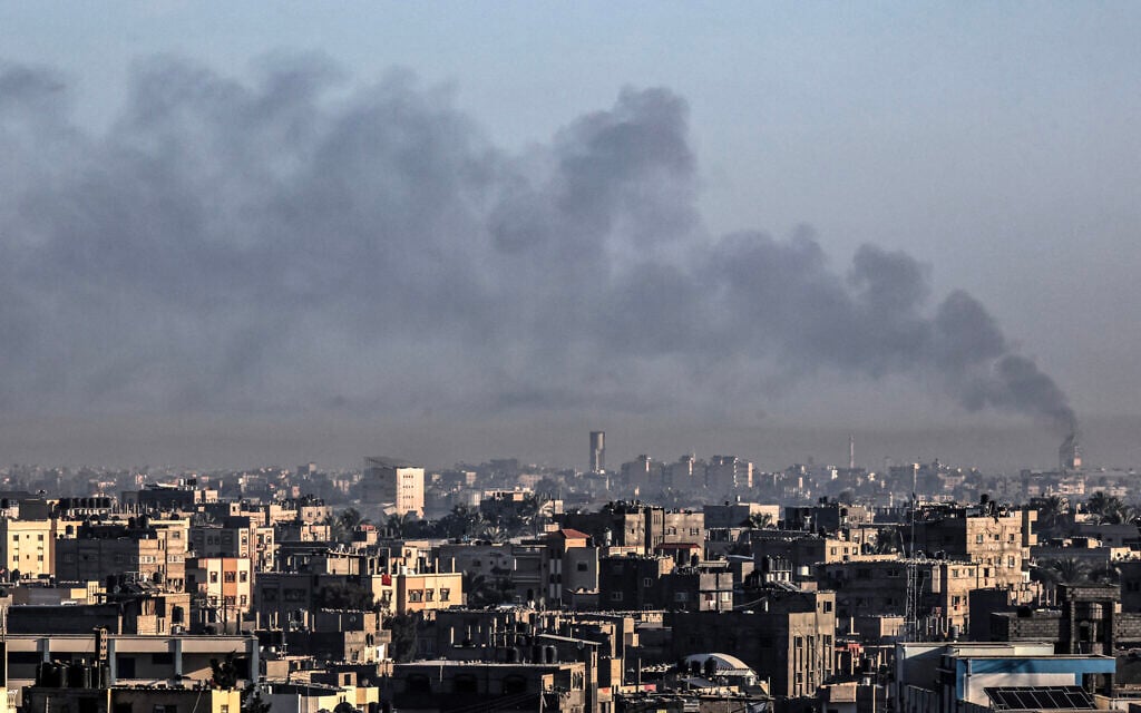 A picture taken from Rafah on January 6, 2024 shows smoke billowing over Khan Yunis in the southern Gaza Strip during Israeli strikes (AFP)